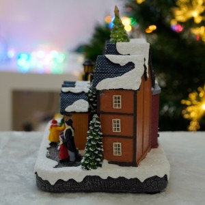 Hot selling CHRISTMAS DECORATION 2024 LED Christmas Village with Turning Function & Music christmas resin christmas gifts